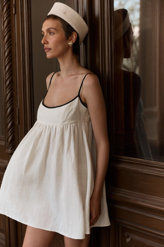 Mini A-line dress with black trim - photo 5